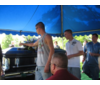 Pall bearers placing a flower